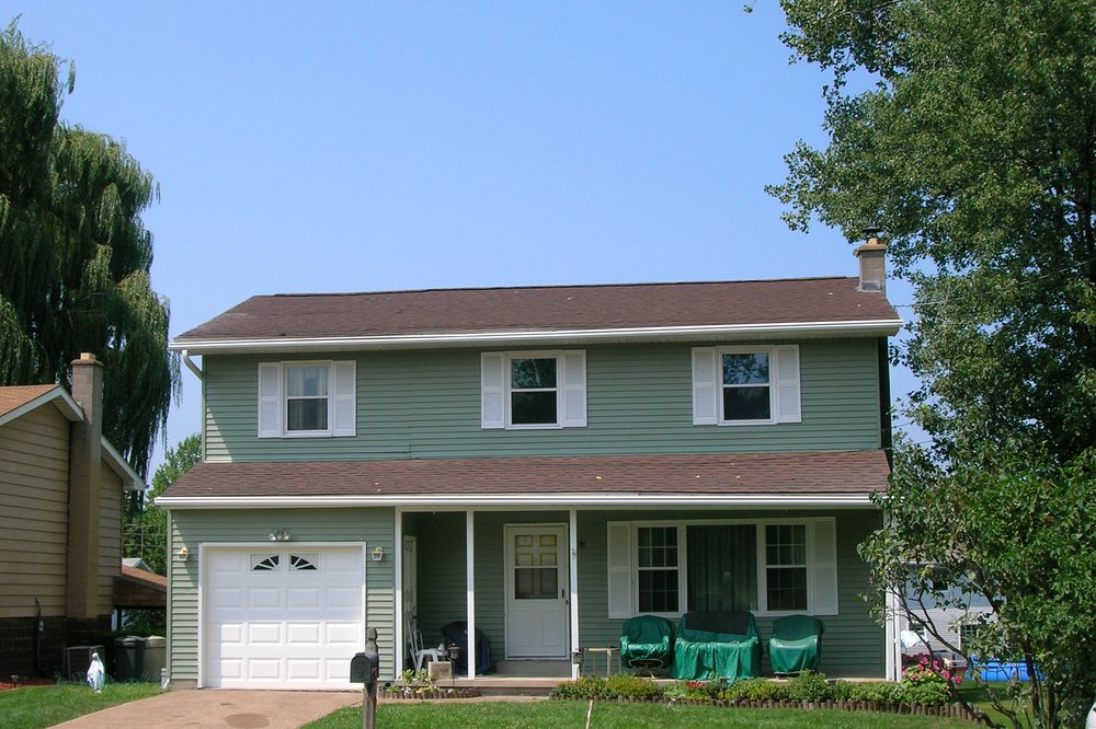 Two-story home with covered porch, fully refinished